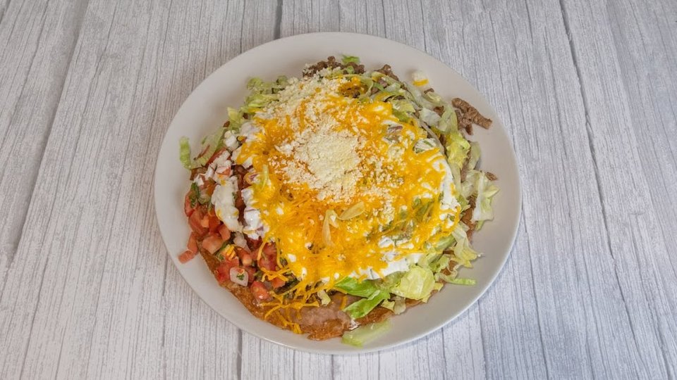 Menu display featuring classic breakfast burritos.
